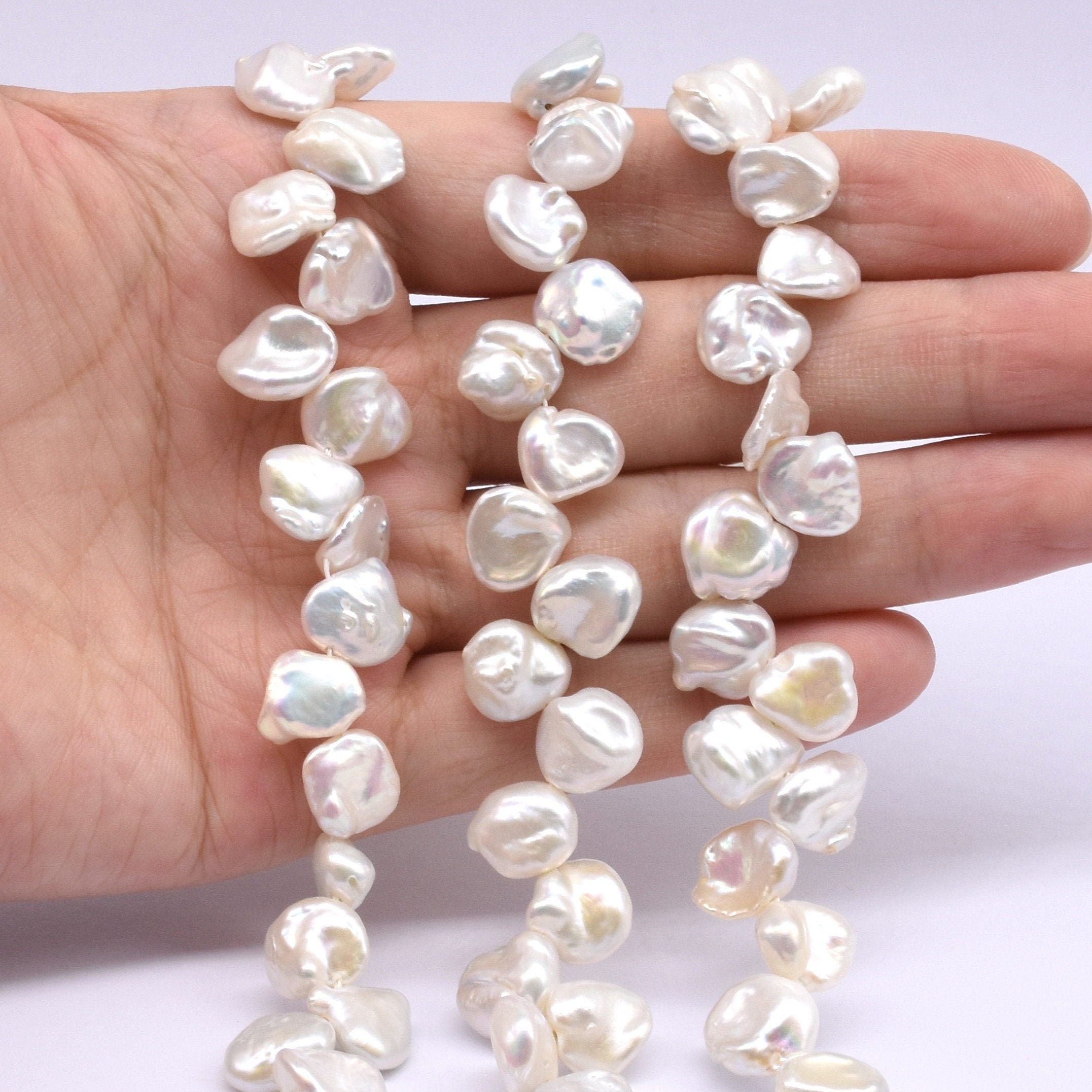 Blushing Ice Chinese freshwater Keshi pearl strands #2 – Pacific Pearls