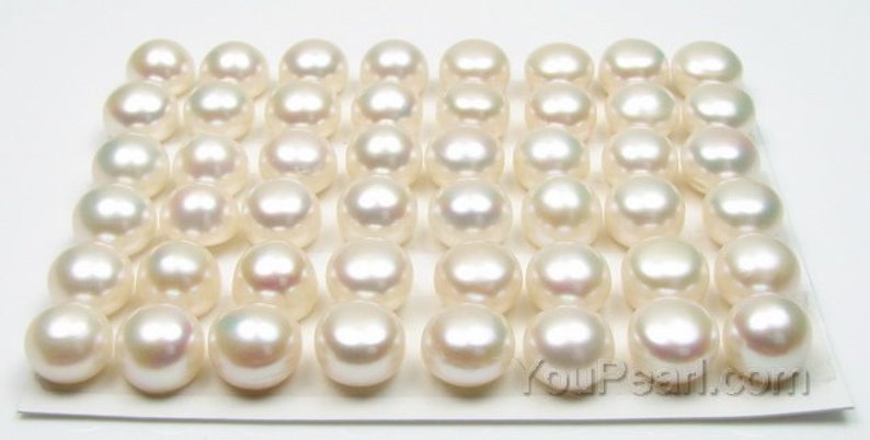 May include: A collection of 49 white round pearls arranged in a grid pattern on a white surface. YouPearl.com is printed in the bottom right corner of the image.