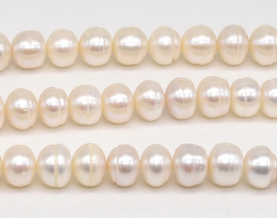 White Stunning Large Round Fresh Water Cultured Pearls 11-12mm (15-Inch  Strand) 