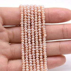 May include: A strand of pale pink freshwater pearls, approximately 4-5mm in size, with a slightly irregular shape. The pearls are strung on a clear thread and are ready for jewelry making.