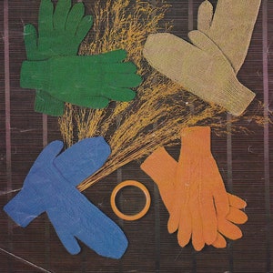 May include: Four pairs of knitted gloves in different colours and styles. The gloves are arranged on a brown textured background with dried grass in the centre.