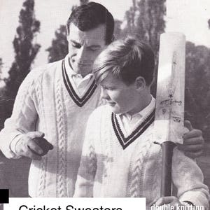 May include: Two people wearing white cricket sweaters with black and navy blue trim. The sweaters are made with a cable knit pattern. The text "Cricket Sweaters" and "double knitting" is visible on the image. The text "Sizes 26 to 44" is also visible.