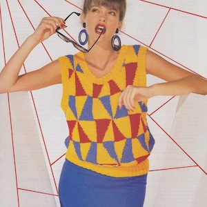 May include: A woman wearing a sleeveless yellow, red, and blue geometric patterned sweater vest with a blue skirt. The text "DK 32-38 inch 81-97 cm" is in the top right corner of the image.