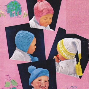 May include: Four children wearing different knitted hats. The hats are in pink, blue, white and yellow. The hats are all different styles and have different textures.