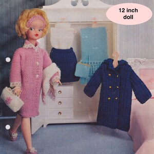 May include: A pink knitted coat, a blue knitted coat, a white knitted top, a blue knitted skirt, and a white knitted bag. The clothing is for a 12 inch doll. "12 inch doll" is written in white text on a pink circle.