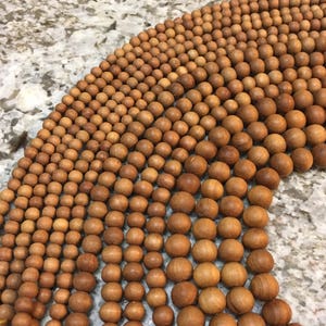 10mm Sandalwood Beads - Highest Quality Pure Natural and Polished, Pack of 54 Beads or 2 Packs for a Mala.