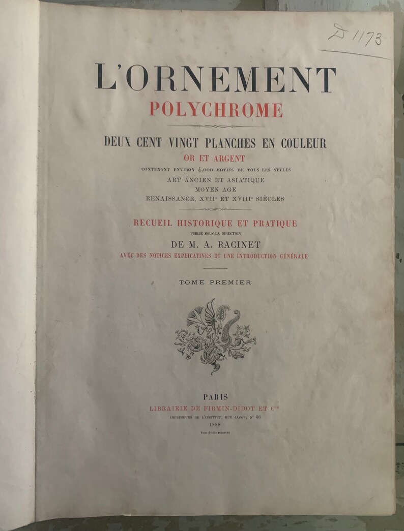 May include: A book cover titled "L'Ornement Polychrome" with the subtitle "Deux Cent Vingt Planches en Couleur Or et Argent". The book is a collection of historical and practical ornament designs from various styles, including ancient, Asian, medieval, Renaissance, and 17th and 18th centuries.