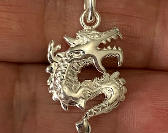 Sterling Silver Dragon Pendant crafted in .925 silver, featuring a sleek design with dimensions of approximately 20mm L. and 14.5mm W.