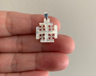 Bethlehem’s Sacred Artistry: Mother of Pearl Jerusalem Cross.  Approx. Size 2cm x 3cm including the jump ring.