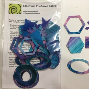 Grab Bag of pre-fused fabric shapes for appliqué Teal & Pink print