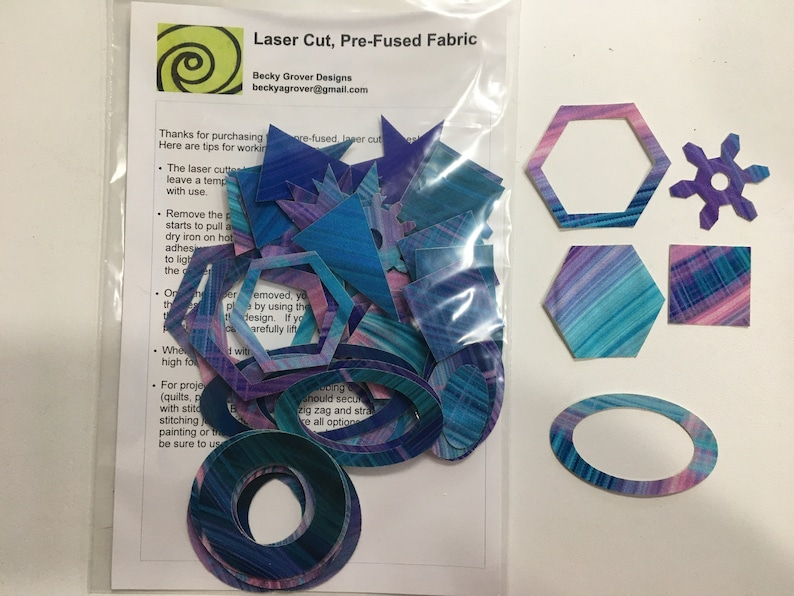 Grab Bag of pre-fused fabric shapes for appliqué Teal & Pink print