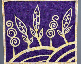 Quilted whimsical garden scene