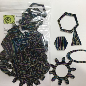 Grab Bag of pre-fused fabric shapes for appliqué Blue & Gold print