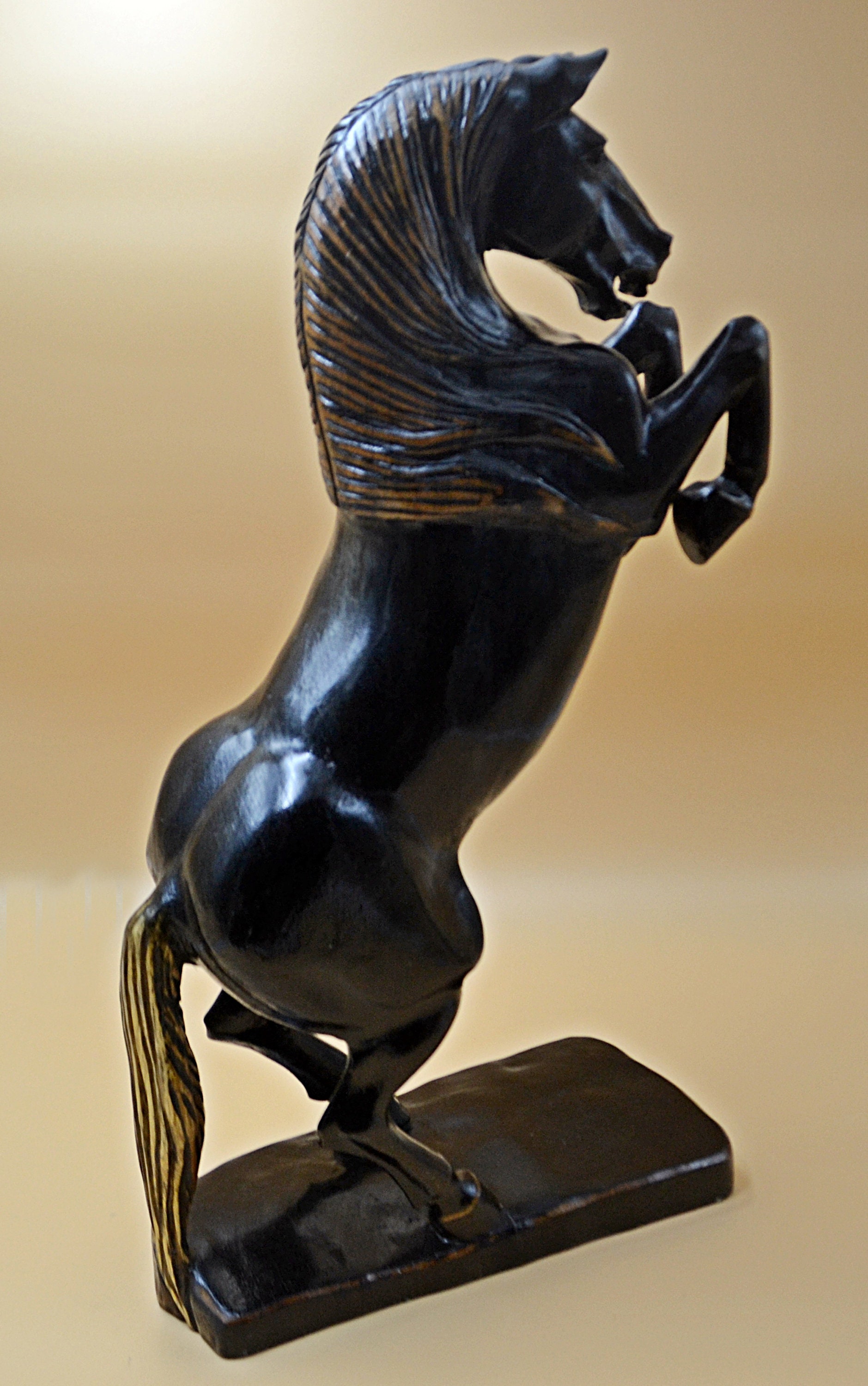 large wooden horse sculpture