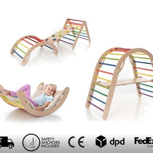May include: A wooden climbing frame with a rainbow ladder, a bridge, and a rocking platform. The frame is made of natural wood and has a light brown finish. The ladder has colorful rungs and the bridge has a textured surface. The rocking platform is shaped like a crescent moon and has a soft cushion.