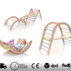 May include: A wooden climbing arch, ramp, and rocker set with pastel-colored rungs. The set includes a climbing arch with a wooden platform, a ramp with climbing holds, and a rocker with a hammock. A child is shown using the rocker.