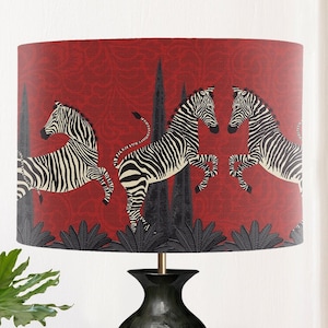 Dancing Zebras on Red Animalia lampshade, Tropical designer fabric, handmade in the UK, red and black design hand drawn, fabric drum shade