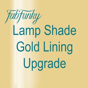 Op de afbeelding: Tekst die "FabFunky" in een gestileerd lettertype leest, gevolgd door "Lamp Shade Gold Lining Upgrade" in een tealblauw lettertype.