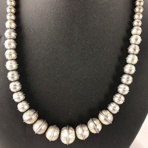 ナバホ族スターリングシルバーペンダント | ターコイズ #8、オニキス