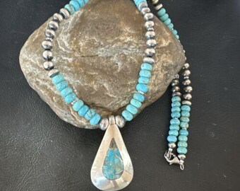 ナバホ族 ブルースパイダーウェブターコイズインレイペンダント