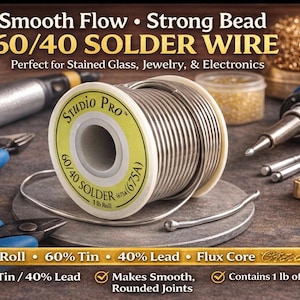 May include: A spool of 60/40 solder wire, labeled "Studio Pro," is the focal point. The image includes soldering tools, pliers, and text indicating it's for stained glass, jewelry, and electronics. The spool contains 1 lb of solder, with 60% tin and 40% lead.