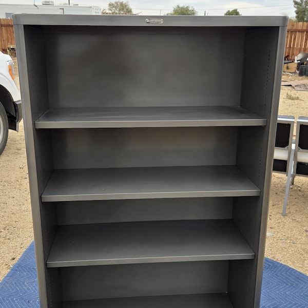 vintage steel tanker bookcase Bookshelf refurbished in brush steel powder coated