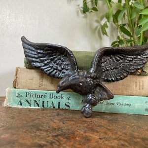 Small black metal eagle