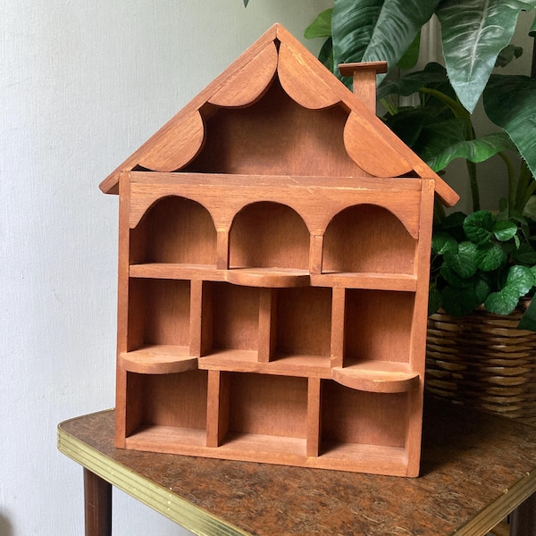 Vintage wood house shelf with scalloped roof