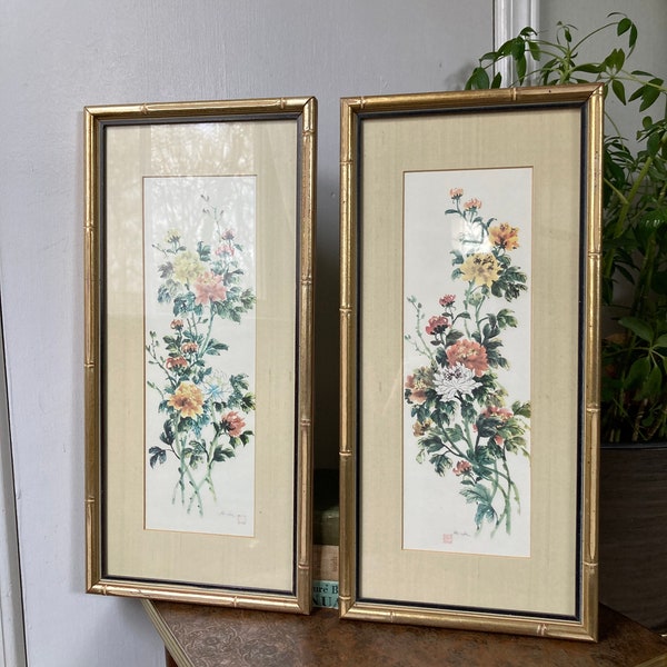 Floral prints in gold faux bamboo frames