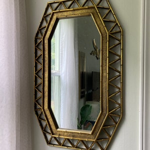 Gold faux bamboo mirror