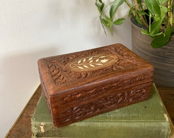 Carved wood box.        M