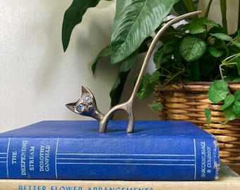 Silver cat with rhinestone eyes