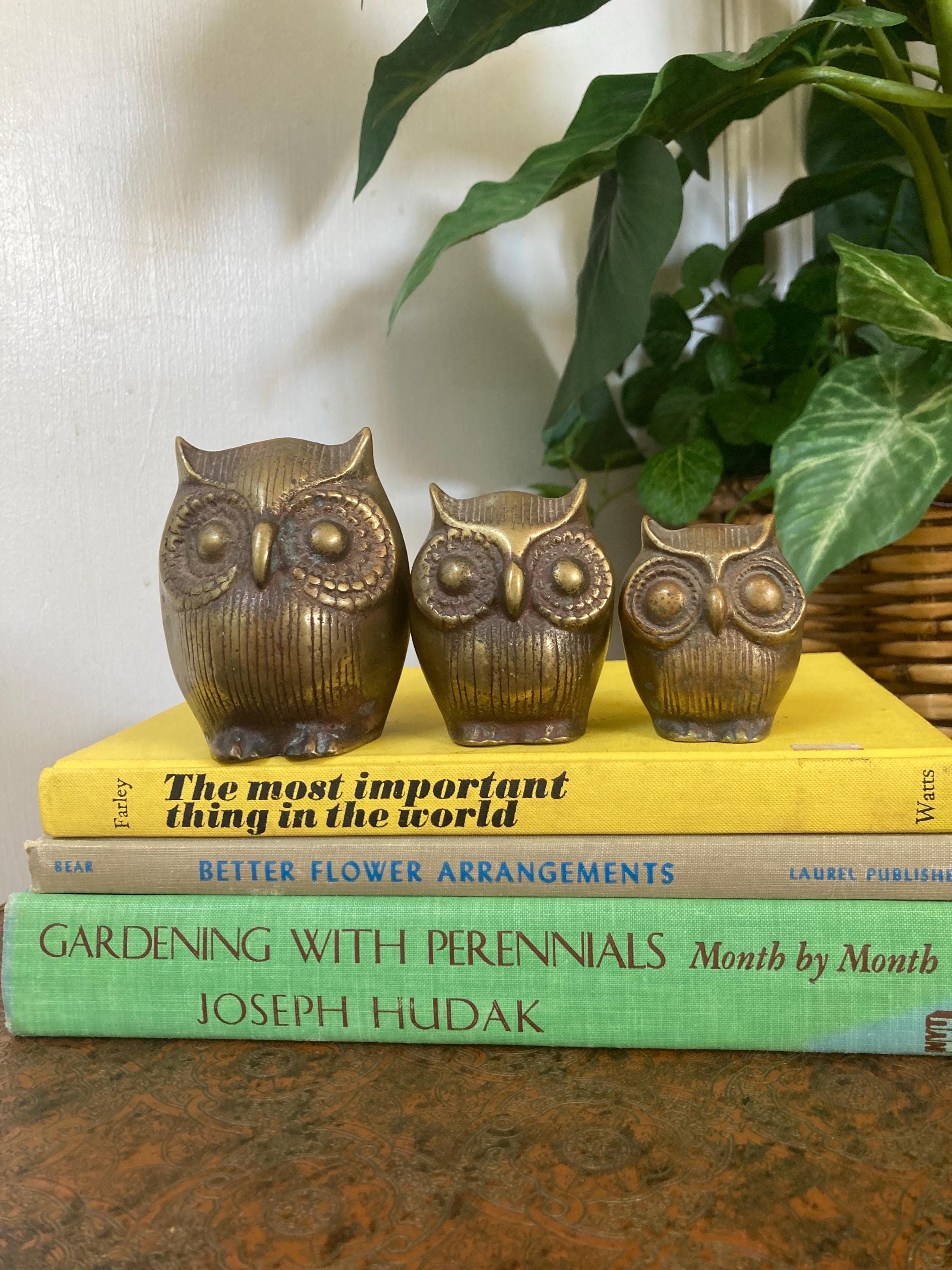 Three brass owls