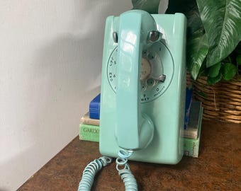 Light blue vintage telephone untested