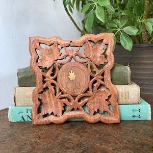 Carved wood trivet