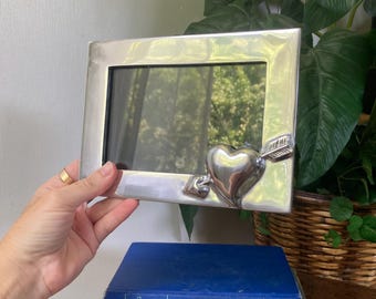 Silver heart and arrow frame