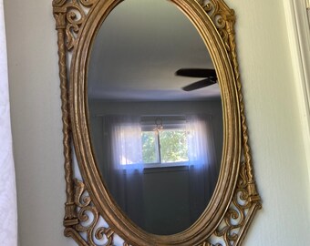 Large gold Syroco mirror