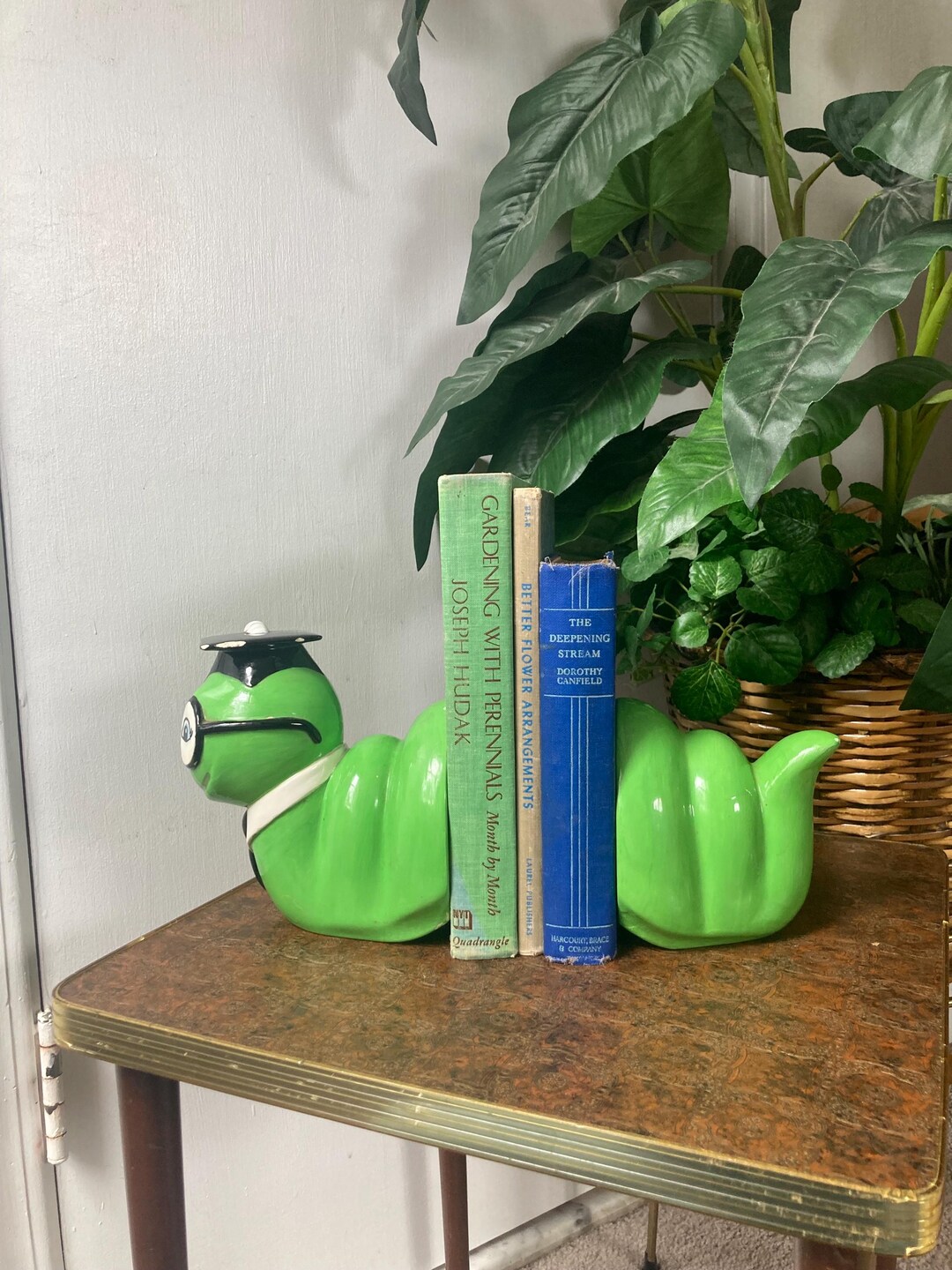 Ceramic bookworm bookends as is - chips on hat