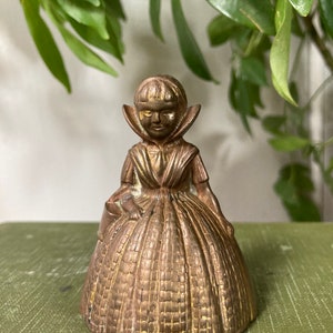 Brass girl bell