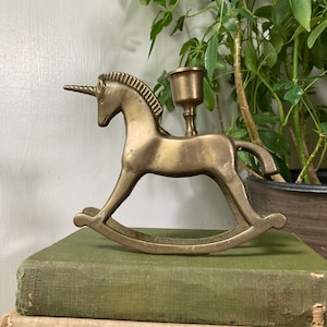 Brass rocking unicorn candle holder