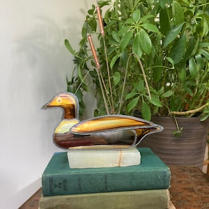 Brass duck and cattails on onyx base