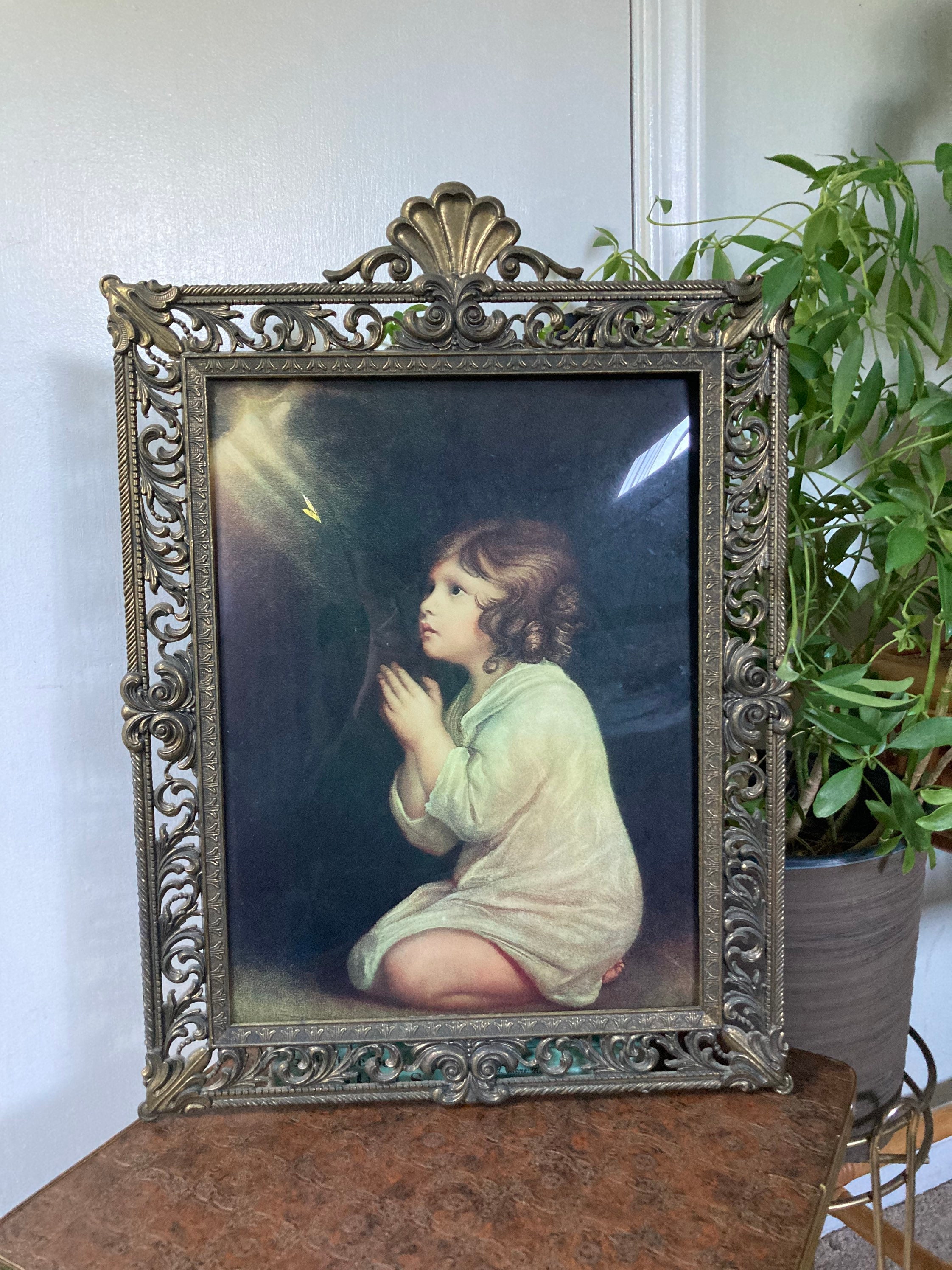 Ornate large brass frame