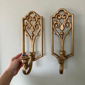 Gold plastic sconces