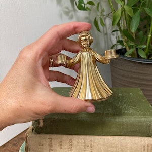 Brass girl candle holder