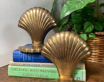 Brass shell bookends.   C
