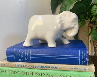 White ceramic elephant planter