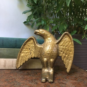 Gold colored cast iron eagle.  M