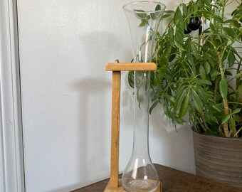 Large propagation vase and wood stand.   B