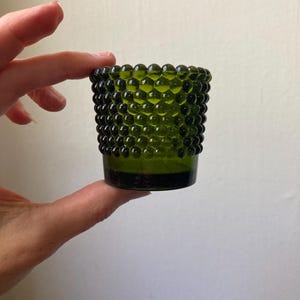 Green glass hobnail votive candle holder as is