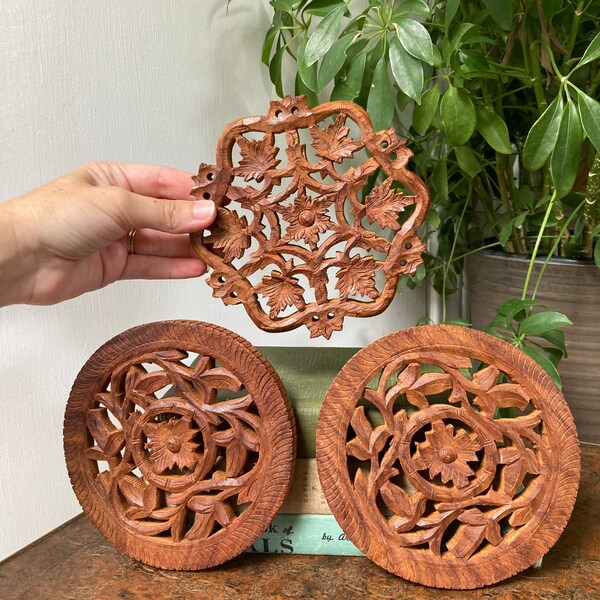 Carved wood trivets